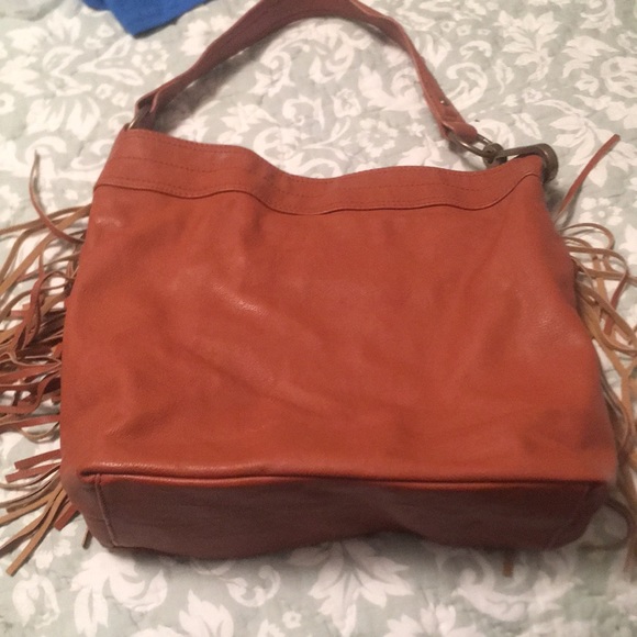 Brown fringe purse by Carlos Santana. - Picture 2 of 4